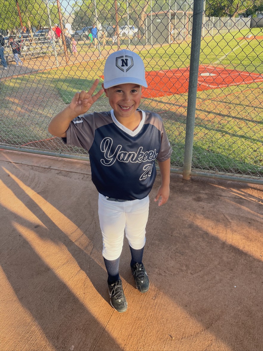 Maddex in his baseball uniform